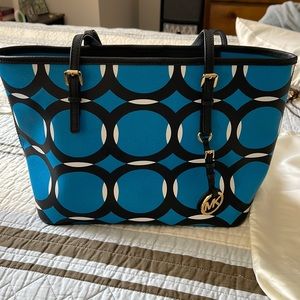 Michael Kors handbag.  Excellent condition, no scratches, comes with dust cover.